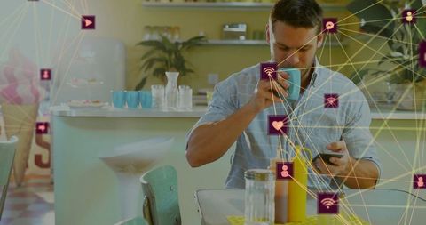 Man Online in Cafe with Connectivity Overlay