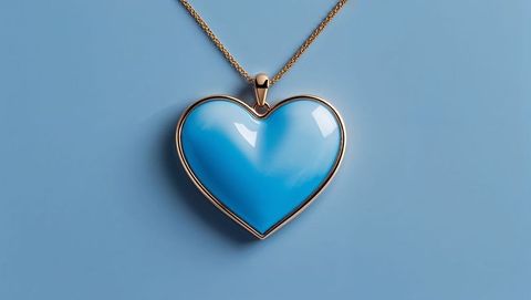 Heart-shaped sky blue enamel pendant with gold chain