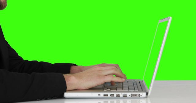 Man Typing on Laptop Computer with Green Screen Background - Download Free Stock Images Pikwizard.com