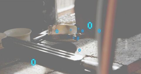 Rustic workshop clamp on worn workbench with glowing blue digital glyphs for industry