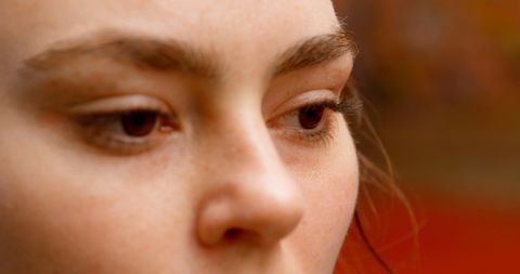 Close-Up of Woman Appearing Contemplative and Tired