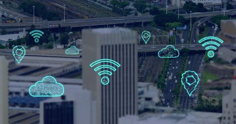 Digital Cloud Computing Icons Overlay on Modern Cityscape