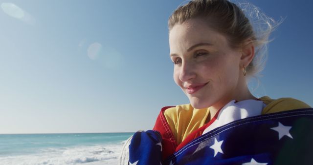Woman Smiling Wrapped in American Flag at Beach - Download Free Stock Images Pikwizard.com