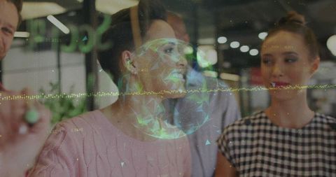 Lead tapping earbud activating holographic globe and waveform during team collaboration