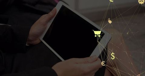 Person Using Tablet with Digital Network Icons Overlay