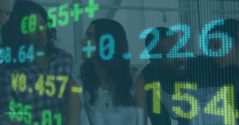 Business Team Analyzing Financial Trends with Digital Display Overlay