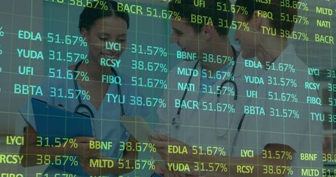 Healthcare Professionals Discussing with Digital Financial Graph Overlay