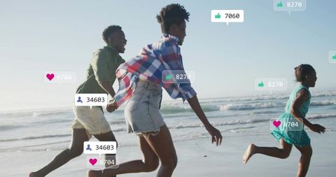 Family running on shoreline with floating social media likes and followers