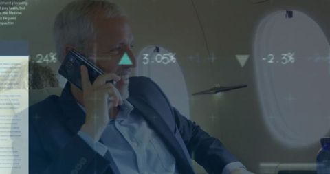 Businessman on private jet analyzing complex financial data