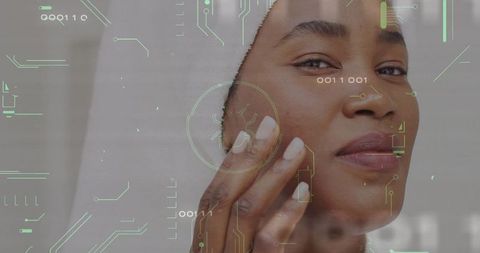 Woman practicing skincare with futuristic tech interface