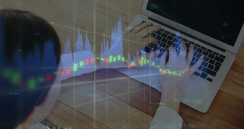 Woman Typing on Laptop with Candlestick Market Chart Overlay for Trading Analysis