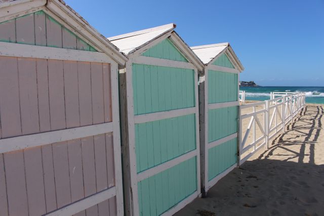 Colorful Beach Cabins by the Ocean - Download Free Stock Photos Pikwizard.com