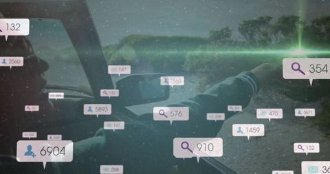 Driver Observing Landscape Surrounded by Digital Connectivity Icons
