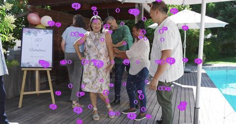 60th Birthday Poolside Celebration: Woman Wearing Sash Laughing While Friends Help