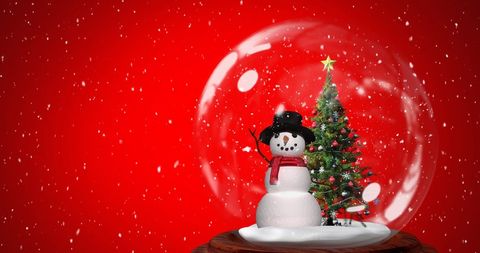 Snowman Snow Globe with Christmas Tree Capturing Holiday Spirit