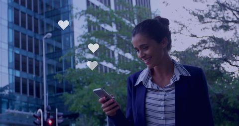 Happy Businesswoman Enjoying Social Media in Urban Environment