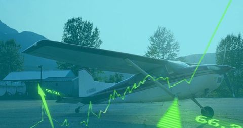High-wing Single-engine Plane on Rural Airstrip with Neon Green Line Graph Data Overlay