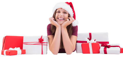 Cheerful woman with christmas gifts wearing santa hat transparent