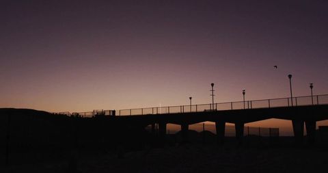 Minimalistic Coastal Pier Silhouette at Tranquil Dusk