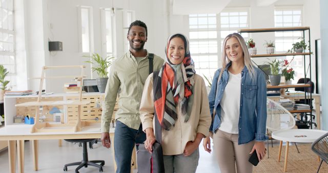 Diverse Group of Young Professionals Smiling in Modern Office - Download Free Stock Images Pikwizard.com