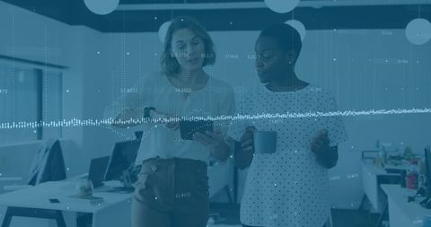 Business Colleagues Analyzing Data Overlay in Modern Office