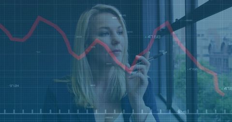 businesswoman analyzing financial trading charts in office setting - Download Free Stock Images Pikwizard.com