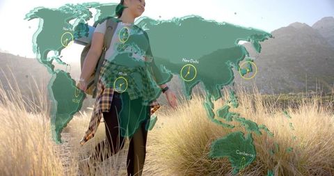 Adventure-seeking hiker on trail with global time zone maps