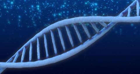 Futuristic dna strand with glowing particles in background