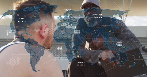 Coach advising athlete on stadium bleachers with data-driven global performance overlay
