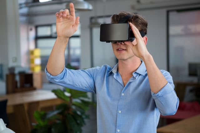 Man using virtual reality headset - Download Free Stock Photos Pikwizard.com
