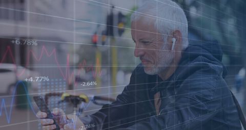 Senior Using Smartphone with Financial Graphs Overlay