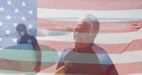 Senior Couple Surfing Against American Flag Backdrop at the Beach - Download Free Stock Images Pikwizard.com