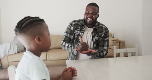 Happy African American Father Teaching Son at Home - Download Free Stock Images Pikwizard.com