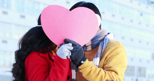 Couple Holding Heart Shape During Winter Embracing Romance - Download Free Stock Images Pikwizard.com