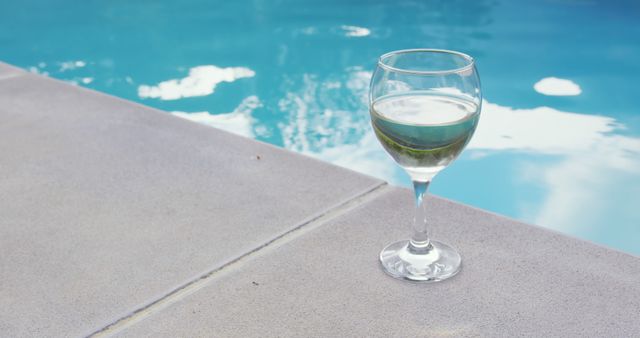 Chilled White Wine by Sunny Swimming Pool Juxtaposition - Download Free Stock Images Pikwizard.com