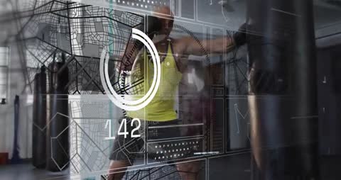 Digital Fitness Analytics with Man Punching Bag in Gym