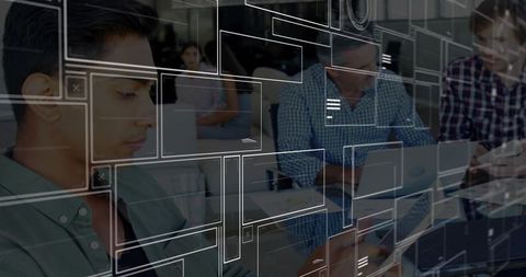 Modern digital collaboration in glass-walled meeting space