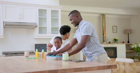 Family Morning Routine with Happy Father and Child in Home Kitchen