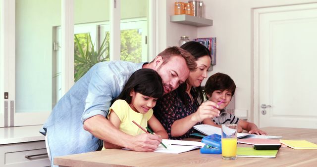 Parents Helping Children with Homework at Kitchen Table - Download Free Stock Images Pikwizard.com