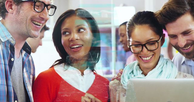 Diverse Team Collaborating on Laptop at Modern Office - Download Free Stock Images Pikwizard.com