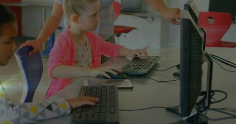 Schoolchildren Learning Computer Skills with Teacher Assistance - Download Free Stock Images Pikwizard.com
