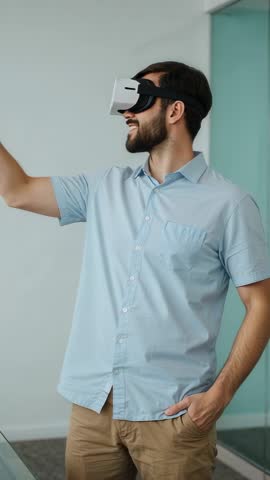 Man Interacting with Virtual Interface Using VR Headset and Stylus in Office Vertical Video