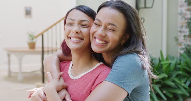 Happy Mother And Daughter Bonding With Hug In Cozy Home - Download Free Stock Images Pikwizard.com