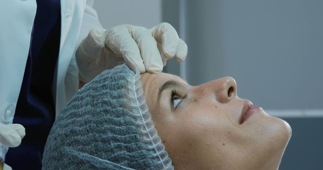 Close-up of Doctor Examining Patient's Forehead Skin - Download Free Stock Images Pikwizard.com