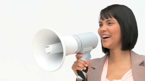 Confident Businesswoman Communicates with Loudspeaker