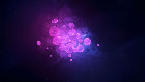 Glowing pink-purple nebula cluster of translucent floating spheres and holographic orbs