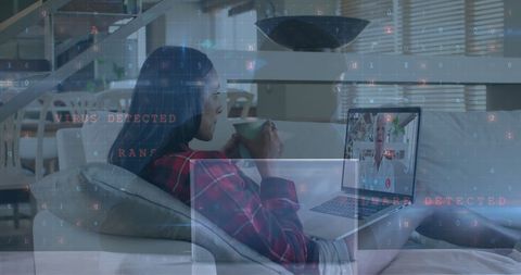 Woman Video Calling on Laptop Amidst Cyber Security Warnings