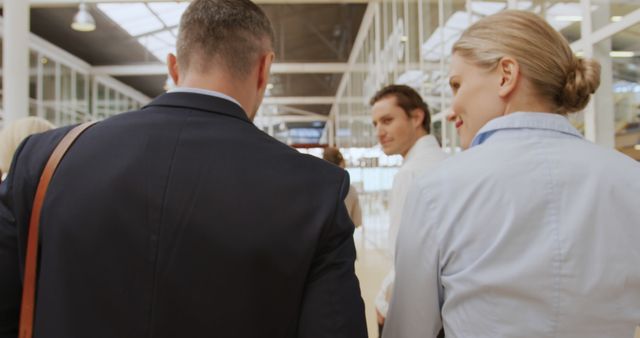 Business Professionals Walking through Office Hallway - Download Free Stock Images Pikwizard.com