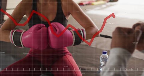 Boxer Analyzing Financial Data During Intense Training - Download Free Stock Images Pikwizard.com