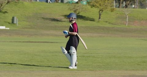 Female Cricketers Celebrating Victory on Field with Team Spirit